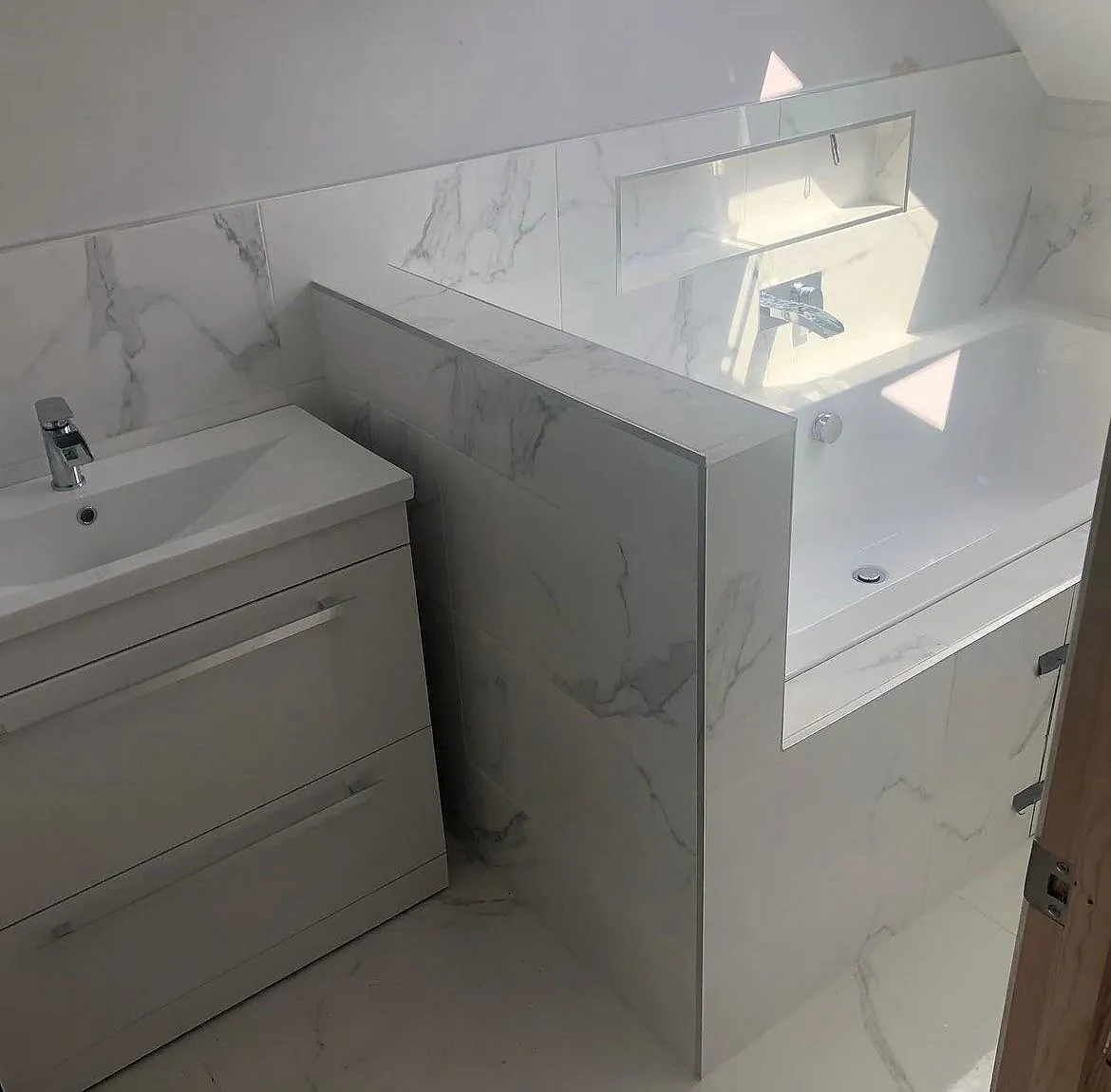 white vanity unit and bath